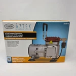 Testors Aztek AC100 Compact Airbrush Compressor 50201A. Fixed Price $187.46.