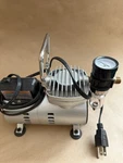 Central Pneumatic Mini Air Compressor Brush & Hose Item 95630 120VAC 30PSI. Fixed Price $35.00.