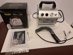 Is 50 Iwata Silver Jet 110-120V Airbrush Compressor. Fixed Price $125.00.