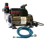 Paasche 1/5 Hp Airbrush Compressor W/ Regulator, Holders & 1/8"BPS Hose. Fixed Price $135.00.