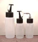 Iwata 1, 1S, I-4702S Plastic Bottles 1OZ 2OZ Side Feed All Solvents. Fixed Price $30.00.