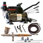 Paasche 1/5 Hp Compressor W/ TG-3AS Gravity Feed Airbrush Set & Cleaning Brushes. Fixed Price $229.95.