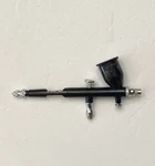 TGX0123 Paasche Vision Double Action Internal Mix Gravity Feed Airbrush. Fixed Price $129.99.