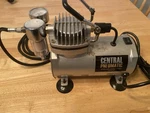 Central Pneumatic 1/5 Hp 58 Psi Oilless Airbrush Compressor Model 60328. Fixed Price $50.00.